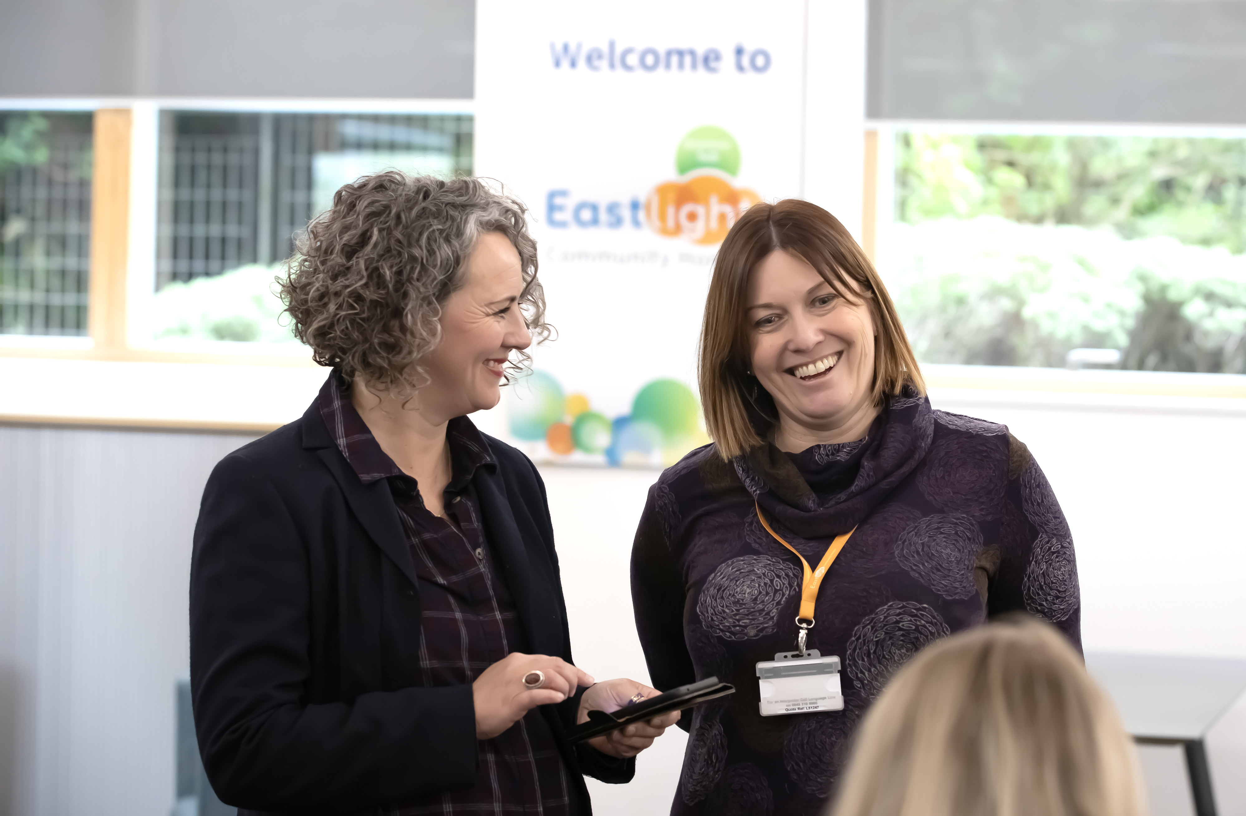 Chief Executive, Emma Palmer - and Executive Director, Jo Barrett - smiling in conversation