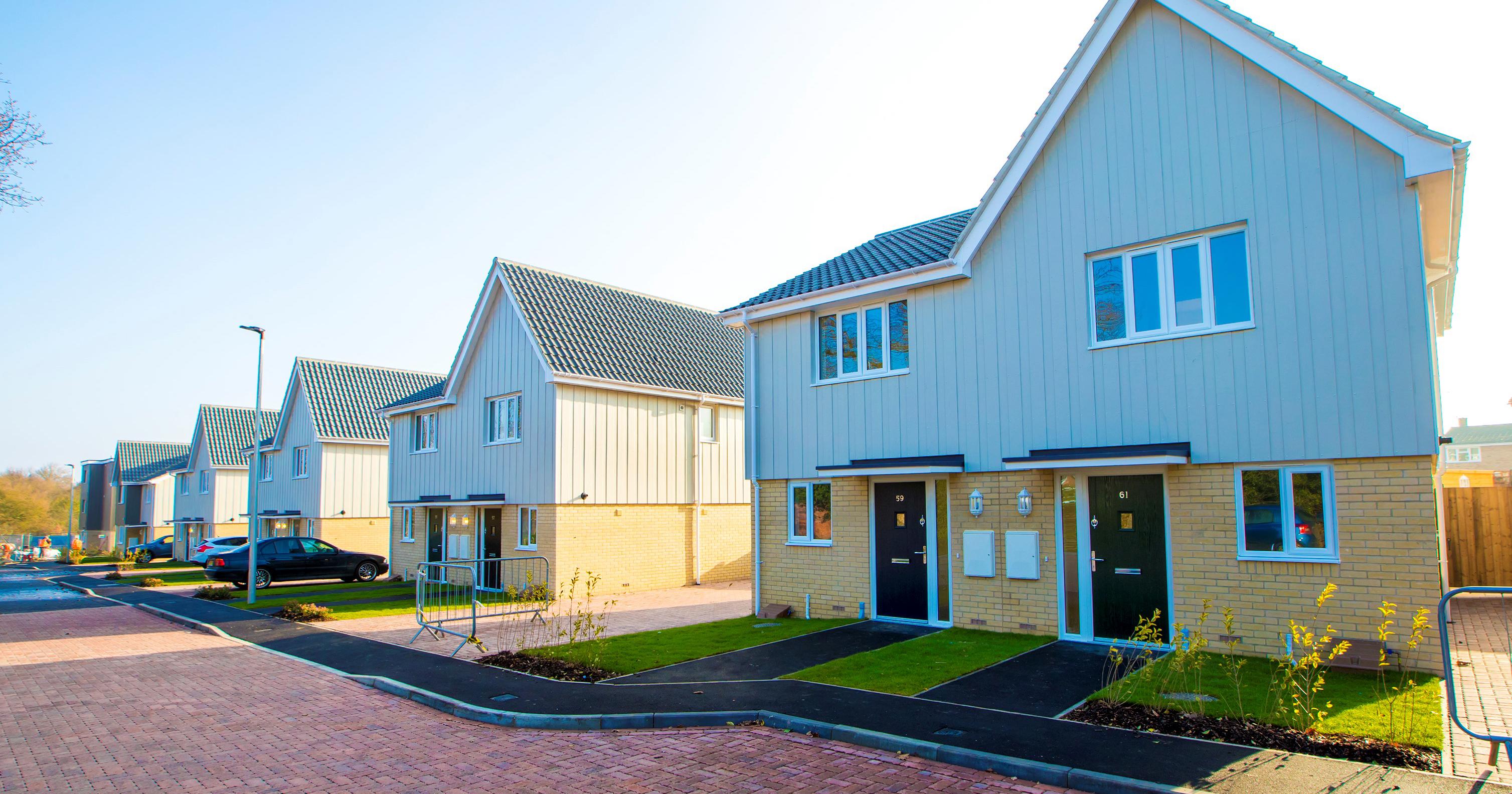 A row of new-build semi-detached houses.