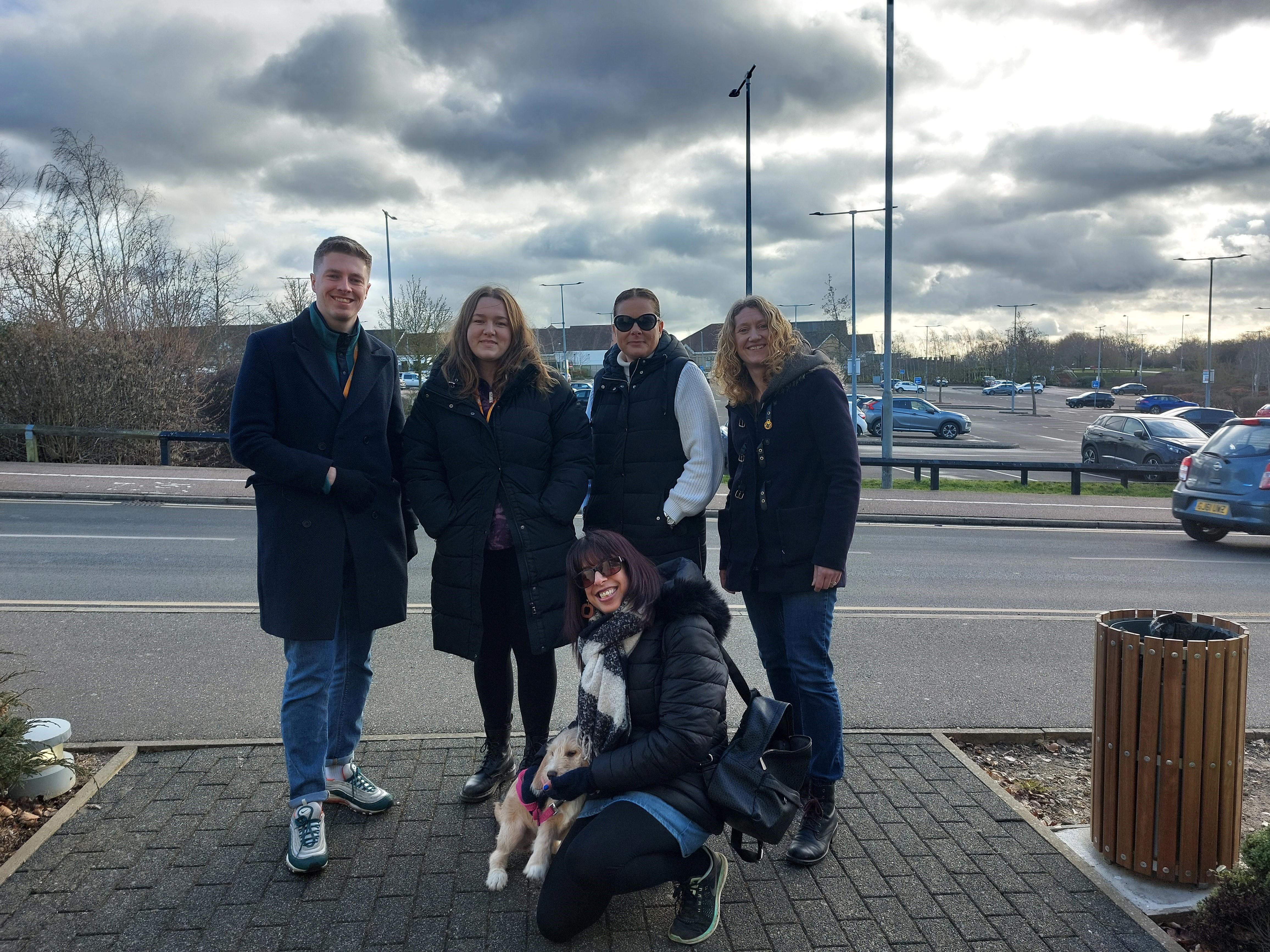 Staff preparing for a mental wellness dog walk 